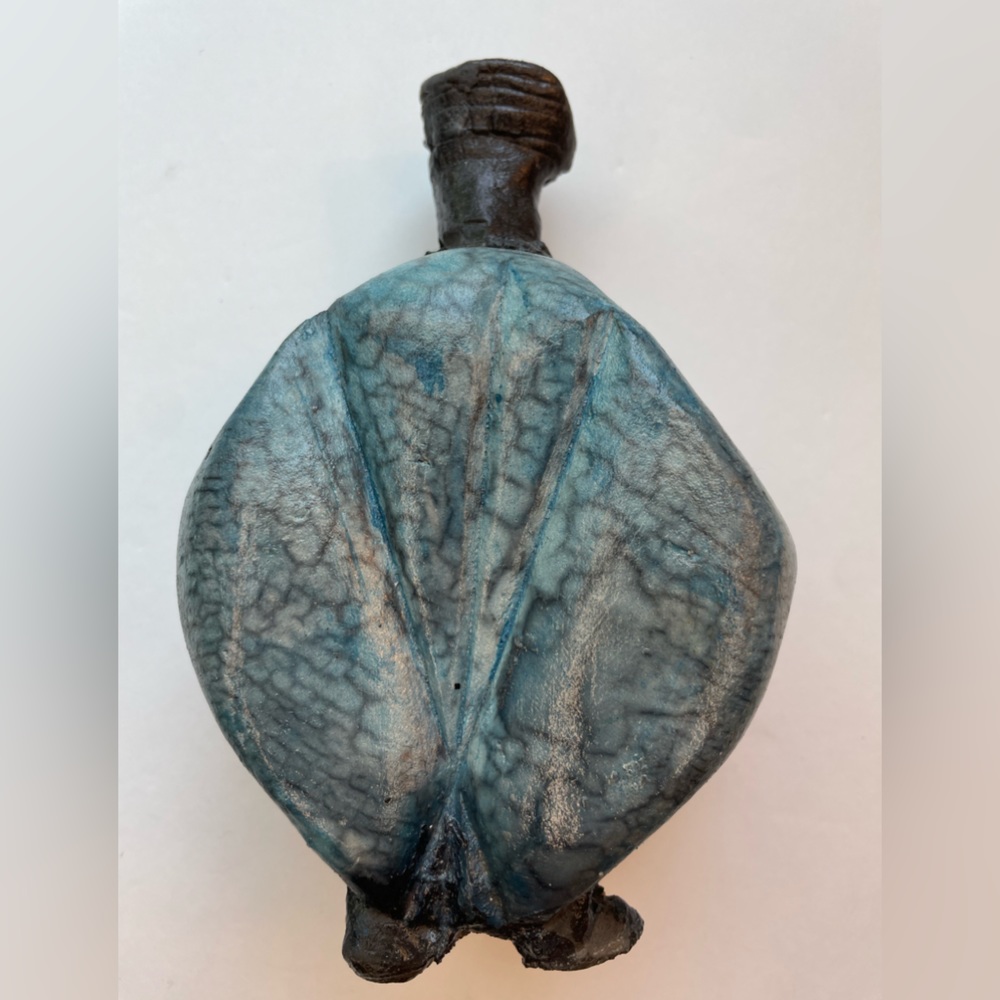 Handmade art pottery blue and black raku pottery vase with feet
